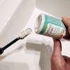 Application of powdered toothpaste on the toothbrush